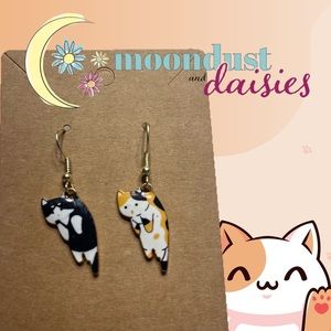 Mismatched and precious hanging cat earrings